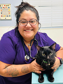 Vet tech Emily Vega with cat - Zoetis