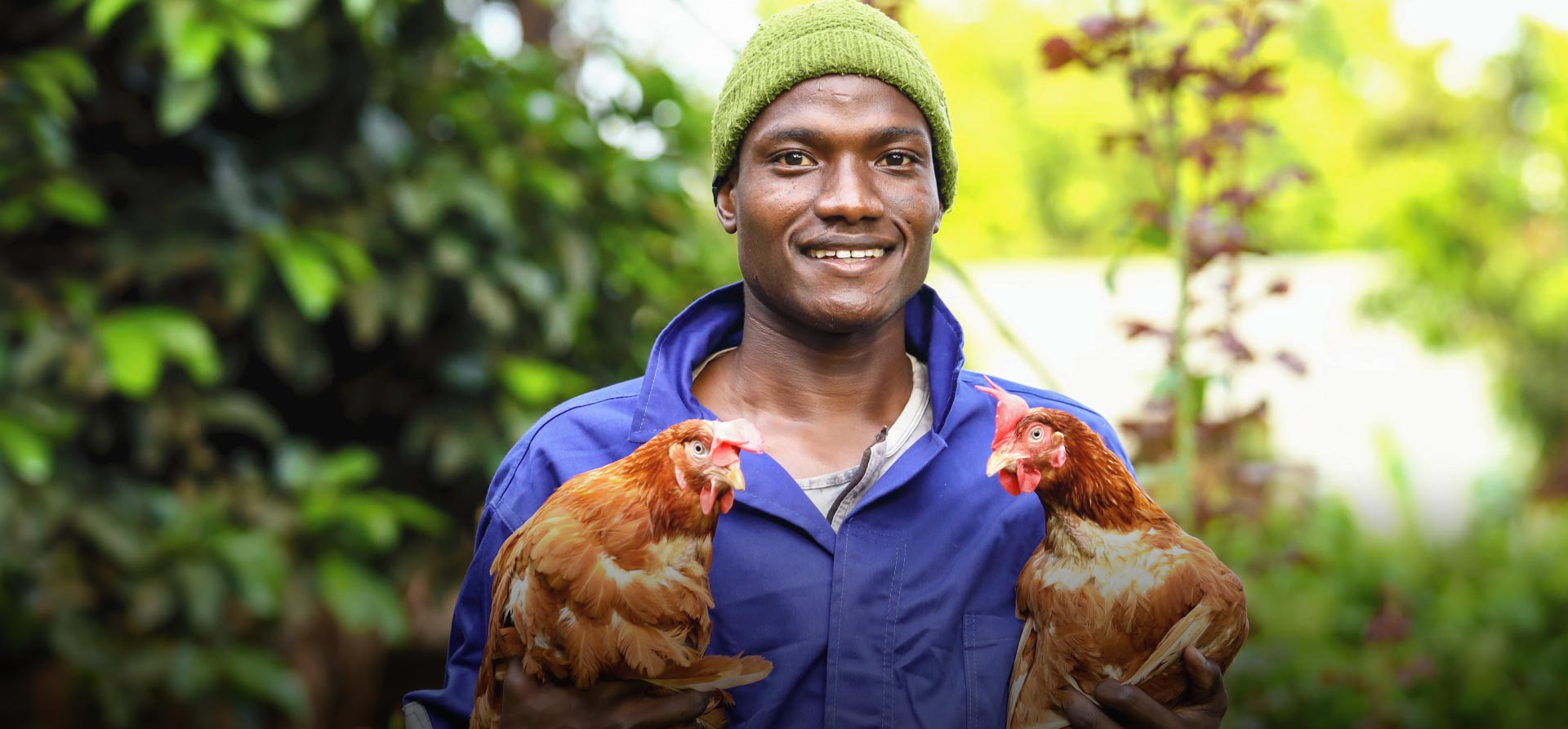 Farmers with chickens - Zoetis